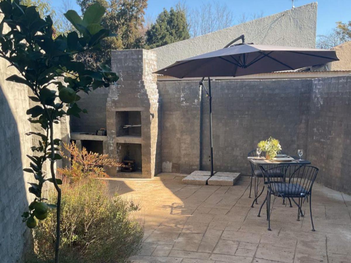 Private courtyard with braai and umbrella