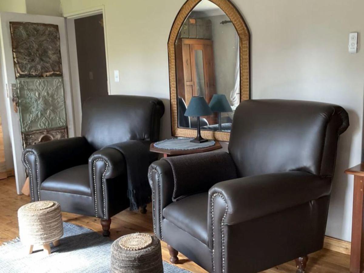 Leather armchairs in the sitting area